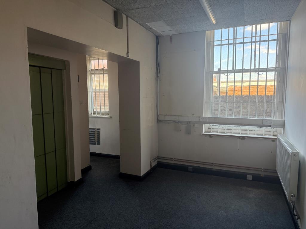 Lot: 118 - FORMER BANK PREMISES - UPPER PARTS PLUS PARKING WITH POTENTIAL - Store room with access to lift